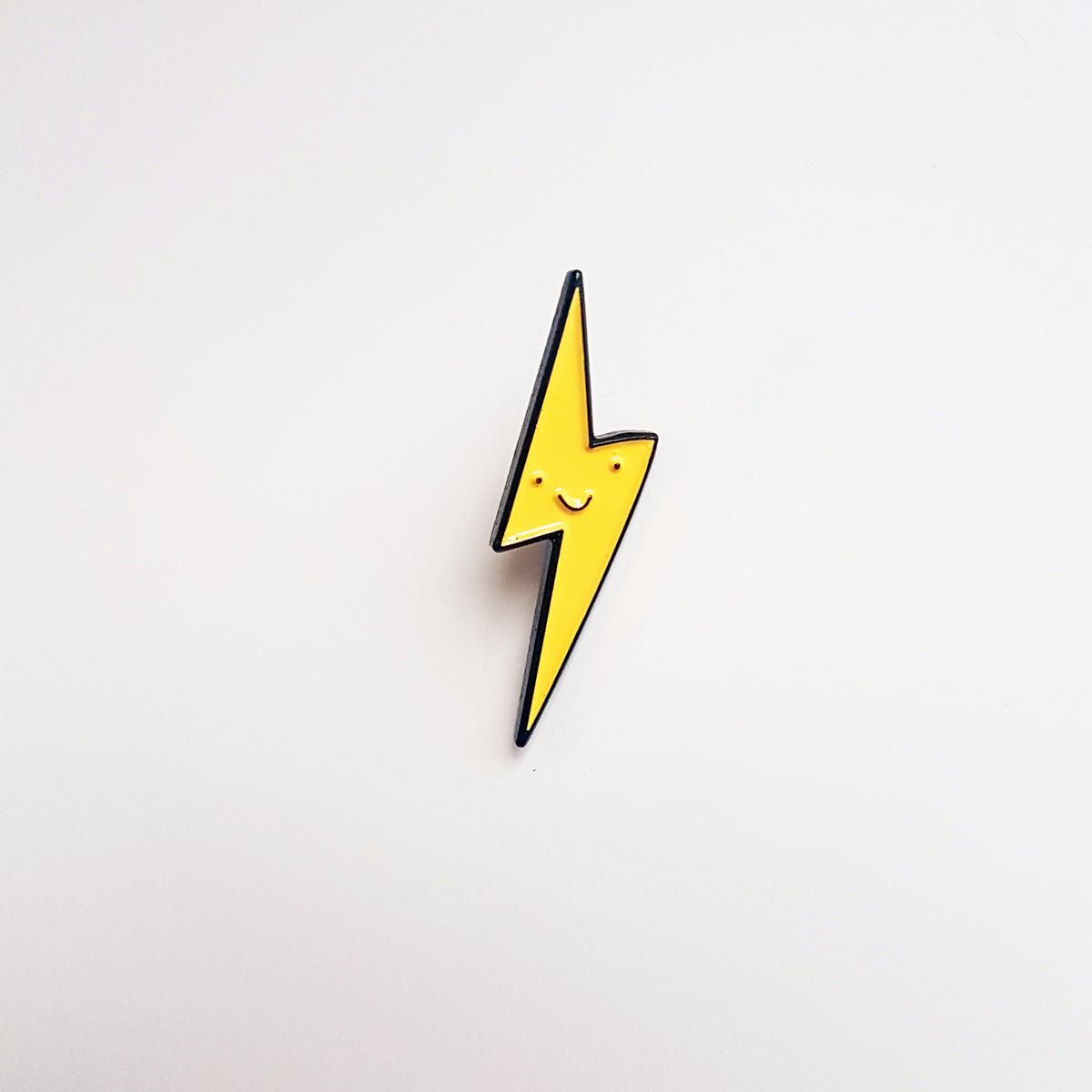ELECTRIC SMILEY PIN
